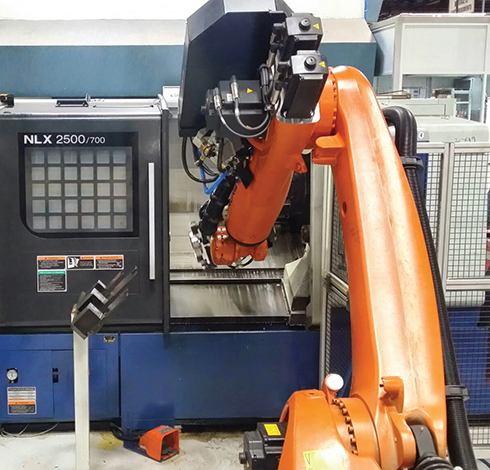 A work cell is formed by two lathes, a marker, a part device detector, the robot and the Equator gauging system.