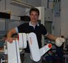 John Barrowman with a Renishaw neuromate surgical robot